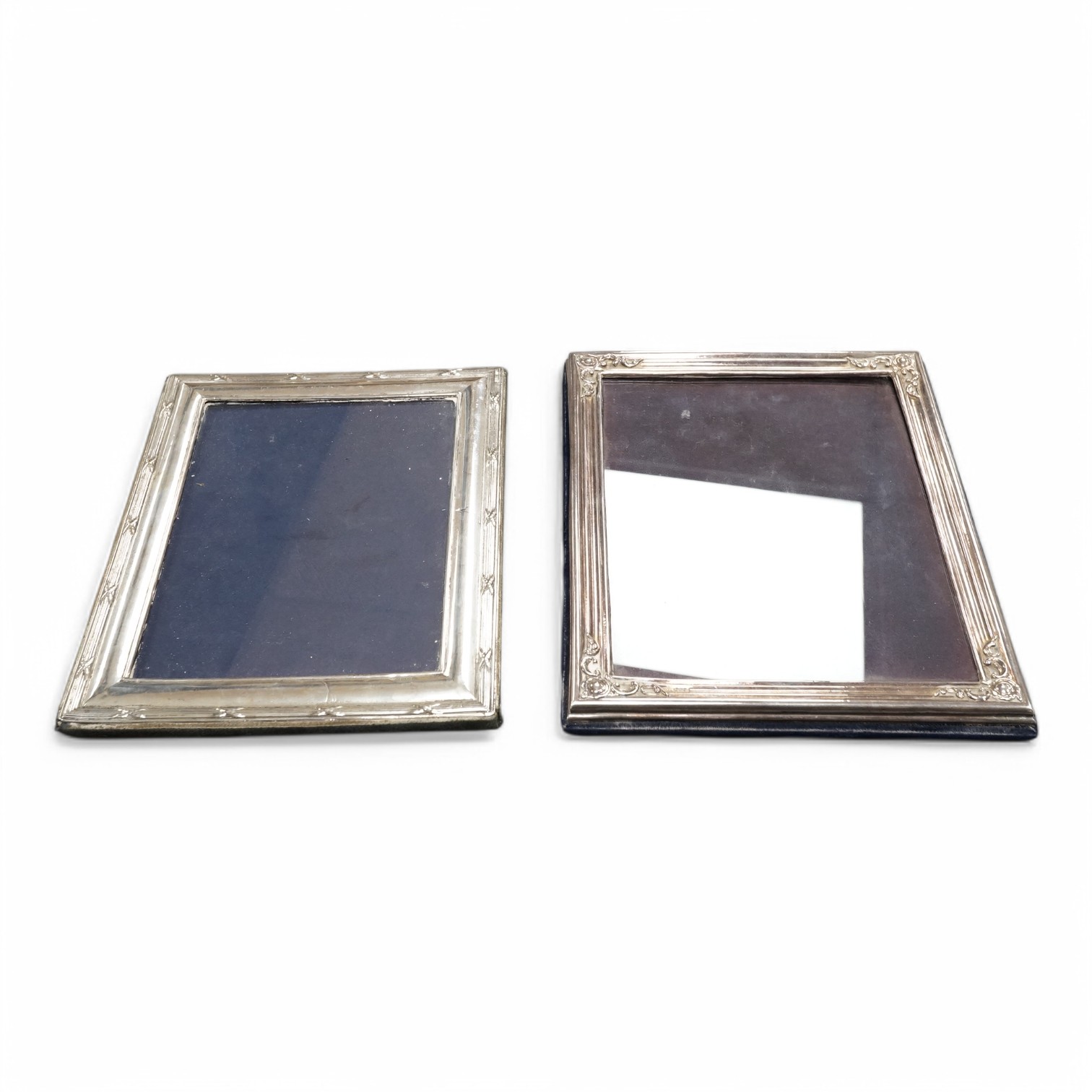 Two modern silver mounted rectangular photograph frames, including Britannia standard, by M&LS, London, 1989 and Keyford Frames Ltd, London, 1988, largest 26.1cm. Condition - poor to fair